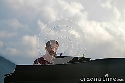 Lago di Santa Croce - July 29th 2023 - the Italian songwriter Daniele Silvestri performing live Editorial Stock Photo