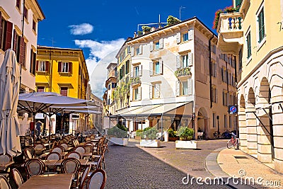 Italian street and cafe in Verona view Stock Photo