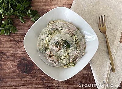 Italian Style broccoli al forno with ham, gorgonzola and cream. Stock Photo