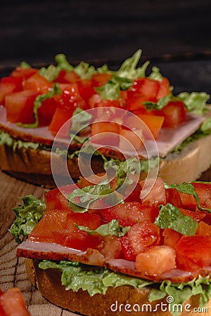 Italian tomato bruschetta with chopped vegetables, herbs and oil on grilled or toasted crusty ciabatta bread Stock Photo