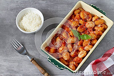 Italian traditional baked dish`Gnocchi al Pomodoro e Basilico` Stock Photo