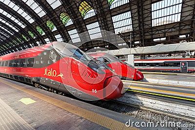 Italo ETR 675 Pendolino high-speed trains of Nuovo Trasporto Viaggiatori NTV in Milano Centrale railway station in Milan, Italy Editorial Stock Photo