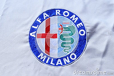 Detail of the blanket in fabric with logo of the Alfa Romeo Spider Duetto vintage car Editorial Stock Photo