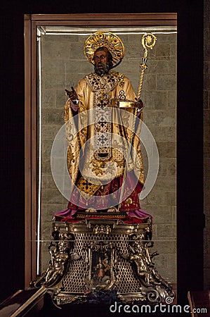 Italy. Bari. Popular devotion. The precious wooden simulacrum of St. Nicholas of Bari kept inside the basilica dedicated to him Editorial Stock Photo