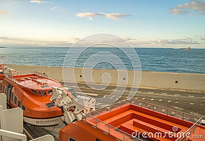Italy, Civitavecchia, October 07, 2018: View of the pier and Parking of tourist buses, from the deck of the cruise liner MSC Editorial Stock Photo