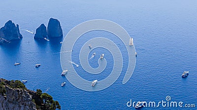 Italy. Island Capri. Faraglioni rocks and boats from Monte Solar Stock Photo