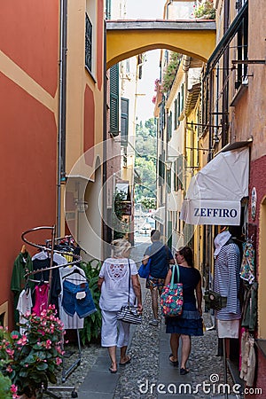 Italy. Liguria. Portofino. People walking in a alley of the Old Town Editorial Stock Photo