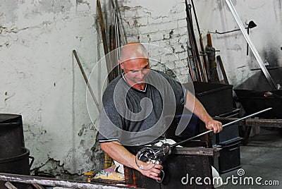 Italy- Murano- Close Up of a Master Glass Blower at Work Editorial Stock Photo