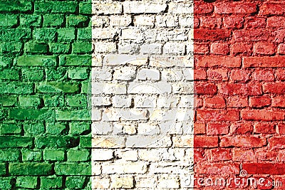 Italy national flag painted on a brick wall with the traditional green, white and red colors. Stock Photo