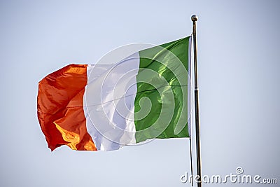 Italy national flag waving in beautiful sky Stock Photo