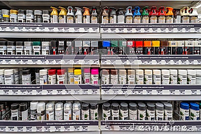 Paint in spray cans of various types and brands Editorial Stock Photo