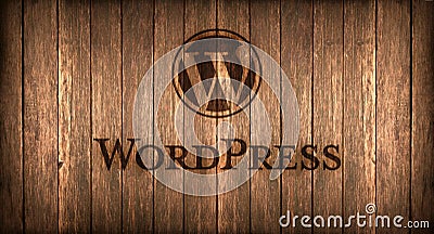 Italy, november 2016 - Wordpress logo printed on fire on a wood Editorial Stock Photo