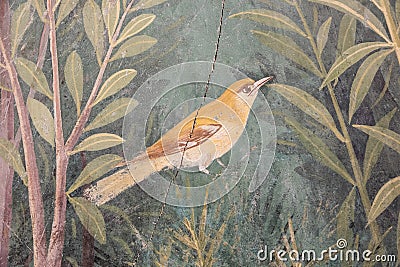 Italy, Pompeii - Luxury roman house interior, fresco detail with bird in a garden Editorial Stock Photo