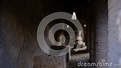 Italy, Pompeii - October 2021: Detail of stone mill in ancient bakery. Pompeii excavations Editorial Stock Photo