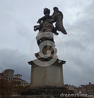 Italy, Rome, Aelian Bridge (Ponte Sant'Angelo), statue Angel with the Superscription Editorial Stock Photo