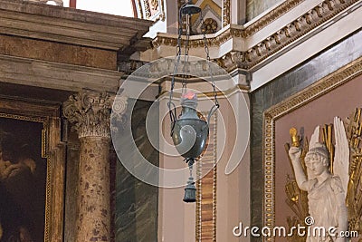 Antique lantern in Jesus and Mary Church, Rome, Italy Editorial Stock Photo