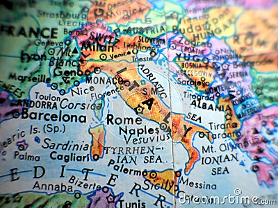 Italy and Rome focus macro shot on globe map for travel blogs, social media, website banners and backgrounds. Stock Photo