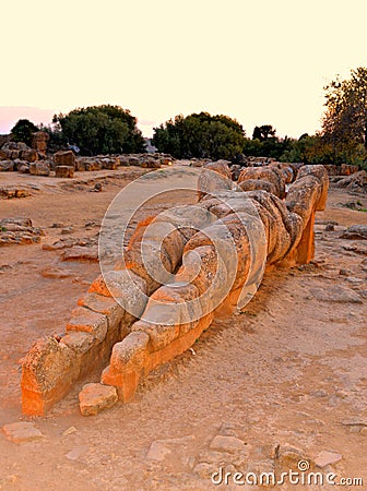 Italy, Sicily island, the valley of the temples of Agrigento, a Telamon, ruin of the giant statue of the temple of Zeus Olympios Editorial Stock Photo