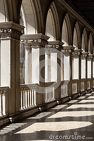 Italy / Venice - 09-08-2017. The arches of the columns of the gallery of the Doge`s Palace in Venice Editorial Stock Photo