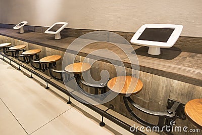 Long table with tablets to use Stock Photo