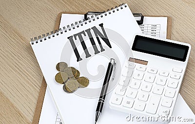 ITIN - Individual Taxpayer Identification Number text with chart and calculator and coins , business concept Stock Photo