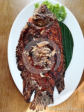 Its called grilled & x22;gurame& x22; Fish in indonesia Stock Photo