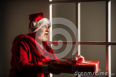 Its yours. New year is coming. happiness and joy. ready for xmas party. celebrate winter holiday. funny man wear santa Stock Photo