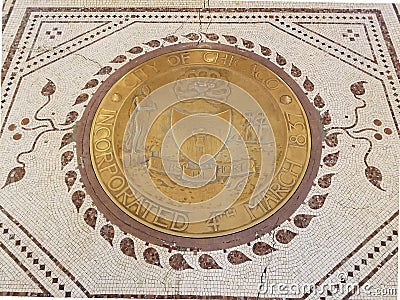 Ity of Chicago incorporated plaque on a mosaic floor. Stock Photo