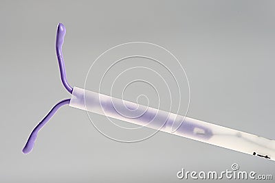 IUD Birth control device Stock Photo