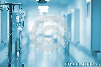 Iv drip on the background of blurred hospital ward Stock Photo