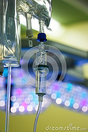 IV drip hanging on a pole in hospital Stock Photo