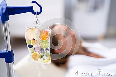 IV Drip Vitamin Infuser Therapy Solution Stock Photo