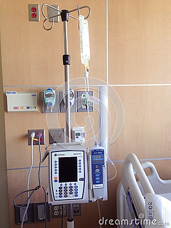 IV pole containing antibiotics in hospital room Editorial Stock Photo