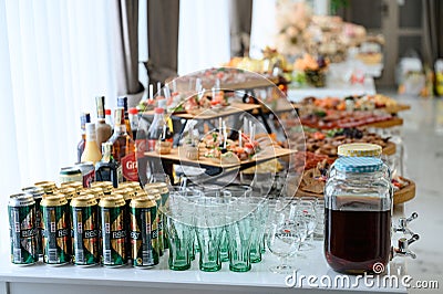 Ivano-Frankivsk, Ukraine February 19, 2023: Ukrainian moonshine on buffet table, home-made Ukrainian vodka. Editorial Stock Photo