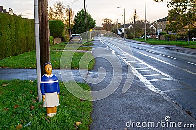 IVER HEATH, BUCKINGAMSHIRE, ENGLAND- 16th November 2020: One of several creepy child-shaped bollards in Iver Editorial Stock Photo