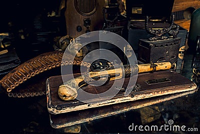 Ivory pistol with a grunge decor Stock Photo