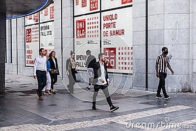 Ixelles, Brussels Capital Region - Belgium - People walking out of the Porte de Namur metro hub Editorial Stock Photo