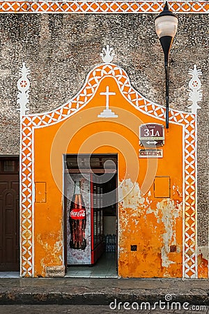 Izamal, Mexico - December 22, 2018: Advertising of Coca Cola in a church shop in the old town of Izamal Editorial Stock Photo