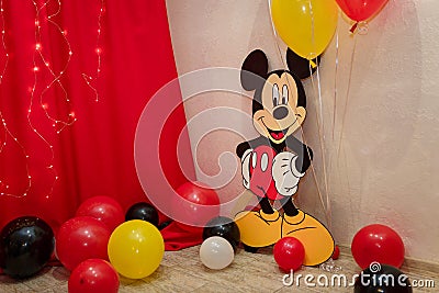 Mickey Mouse party. Character of Walt Disney cartoon with colorful balloons for children Editorial Stock Photo