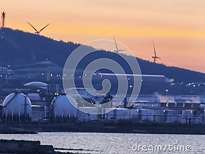 Izmir Aliaga oil refinery with spherical tank, sea bay and distillation towers Editorial Stock Photo