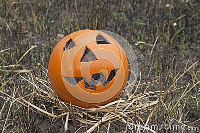 Jack lantern for Halloween of a basketball on scorched earth Stock Photo