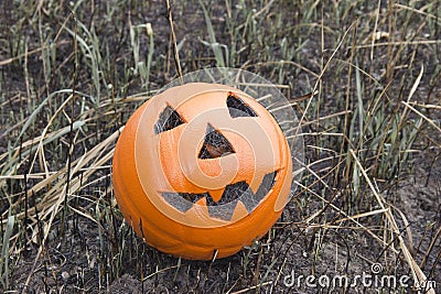 Jack lantern for Halloween of a basketball on scorched earth Stock Photo