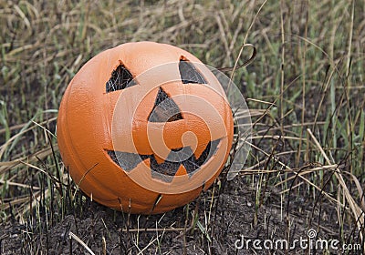 Jack lantern for Halloween of a basketball on scorched earth Stock Photo