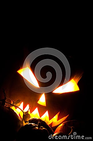 Jack-o-lantern with blazing eyes Stock Photo