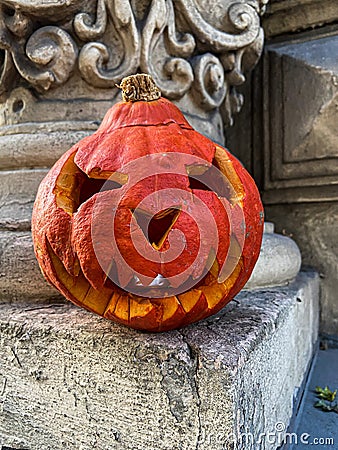 Jack-o`-lantern carved pumpkin with ghoulish face. Halloween tradition Stock Photo