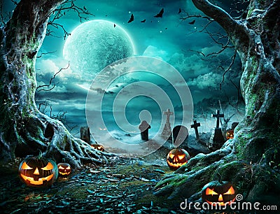 Jack `O Lantern In Cemetery In Spooky Night Stock Photo