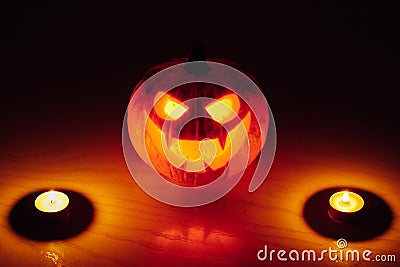 Jack-o-lantern pumpkin candle fire light, Halloween background Stock Photo