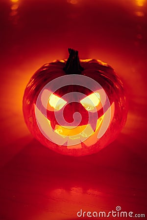 Jack-o-lantern pumpkin orange light, Halloween background Stock Photo