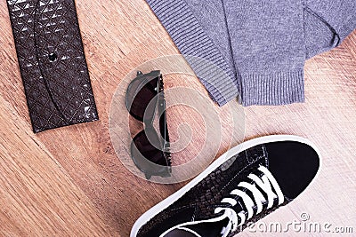 Jacket, sneaker, purse, glasses Stock Photo