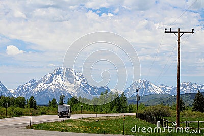 JACKSON HOLE, WYOMING - JUNE 2018 - On the open road - An RV traveling down the open road toward Grand Teton National Park. Editorial Stock Photo